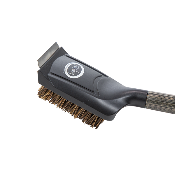 Louisiana Grills’ Palmyra BBQ stainless and natural fibre cleaning brush, focused on brush head
