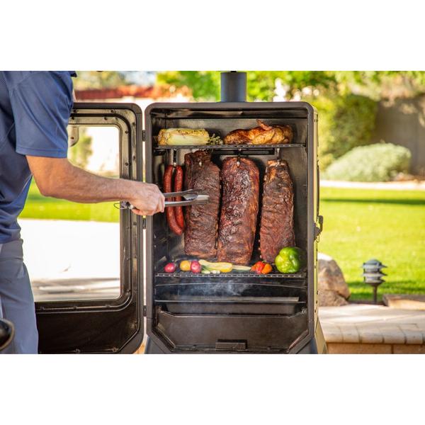 4 Series pellet vertical smoker, in use smoking assorted meats
