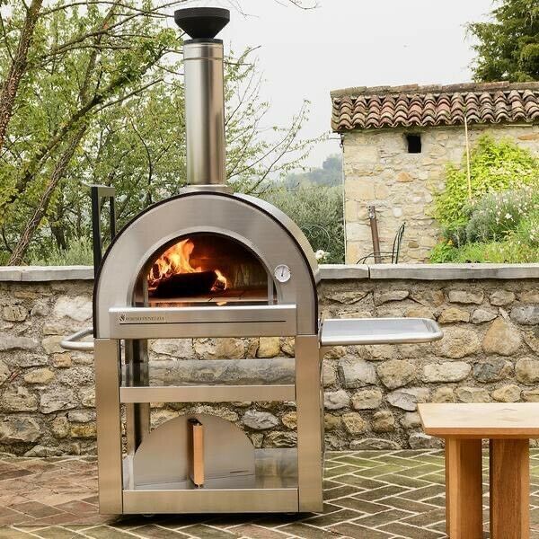 Pronto 500 cart pizza oven, fire burning inside while on the patio
